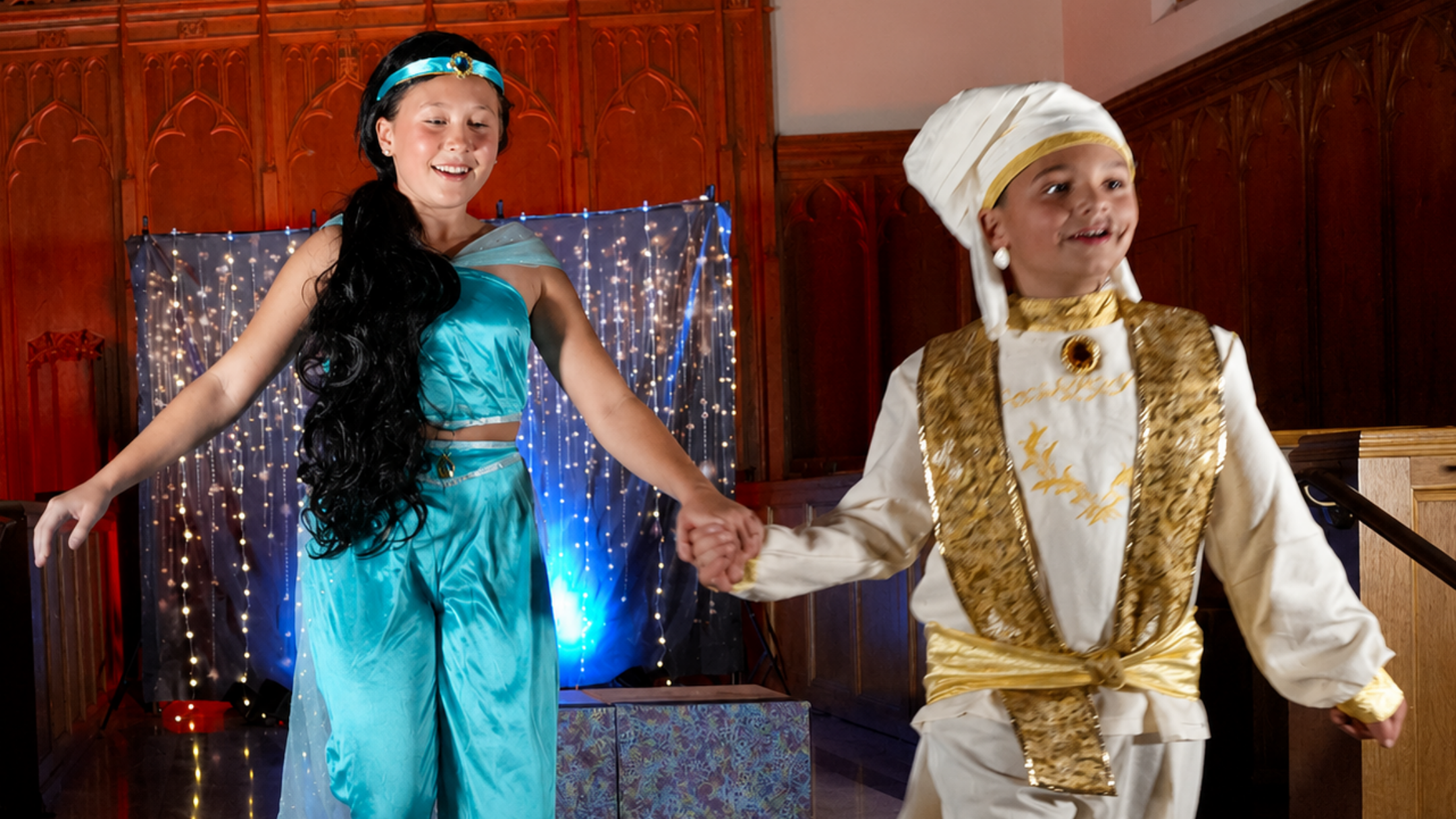 Student performers in an Aladdin scene.